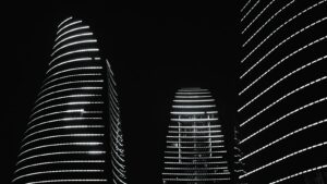 A black and white photo of a city at night